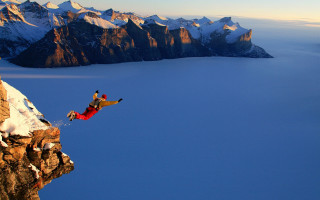 Man jumping cliff snowboard mountain 3 - extreme illustration free wallpaper