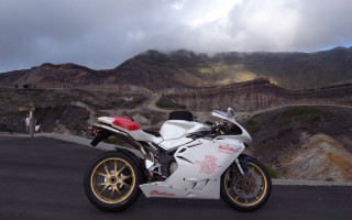 White motorcycle mountain road cloudy - duccio free wallpaper