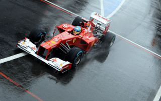 Red racecar wettrack rain pilot - the side of the track free wallpaper