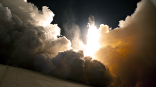 Space shuttle clouds night sky - a space shuttle free wallpaper for desktop