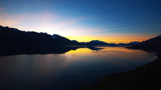 Lake mountains sunset reflection city 2 - a reflection of the water free wallpaper for desktop