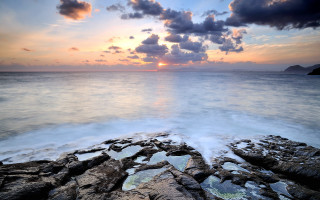 Rocky beach sunset clouds ocean 2 - sunrise free wallpaper