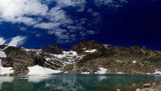 Mountain lake clouds nature reflection - a few snow free wallpaper for desktop