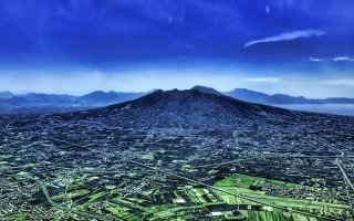 City mountain sky fields urban - a view of a city free wallpaper