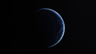Blue planet night sky space - a small amount of light free wallpaper