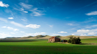 House field mountains sky clouds - a house in a field free wallpaper