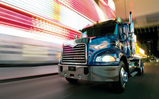 Blue semi truck night street - a street free wallpaper