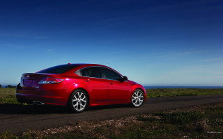 Red car ocean grass sunny - brian fies free wallpaper