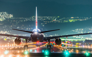 Jetliner night cityscape lights reflection - a large jetliner free wallpaper