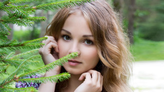 Woman long hair posing tree - free portrait wallpaper for desktop