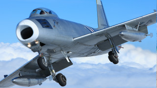 Silver airplane blue sky clouds - a silver airplane free wallpaper