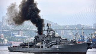 Battleship smoke cityscape military ship - a bridge in the background free wallpaper