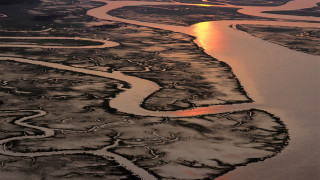 River field sunset ecological art - a sunset in the distance free wallpaper