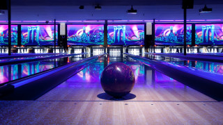 Bowling alley neon cityscape cyberpunk - free sports wallpaper