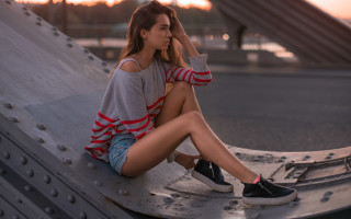 Woman sitting sunset denim fashion - her foot free wallpaper