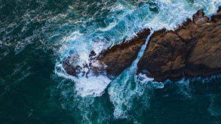 Ocean rock wave birdseye microscopic - a microscopic photo free wallpaper