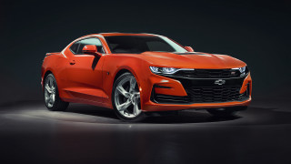 Bright orange chevrolet camaro studio - a studio photo free wallpaper