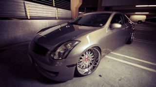 Silver car parking garage night - a parking garage next free wallpaper