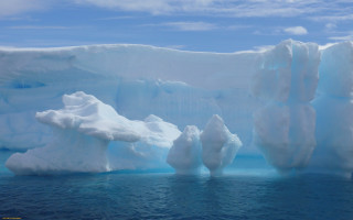 Large iceberg ocean shore ecological - a shore line free wallpaper for desktop