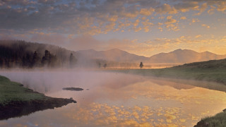 Lake foggy sky person hill - a hill in the distance free wallpaper