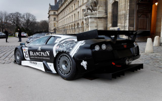 Car large rear clocktower building - a street in front free wallpaper