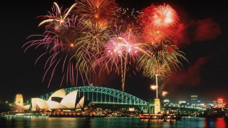Fireworks city bridge night lights - free new year wallpaper