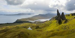 Grassy hill lake mountains clouds - a grassy hill free wallpaper