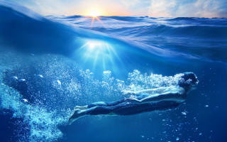 Swimming man under wave ocean - in the ocean free wallpaper