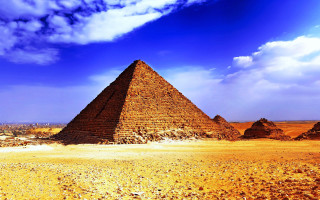 Desert pyramid clouds rocks nyoplasticism - egyptian art free wallpaper