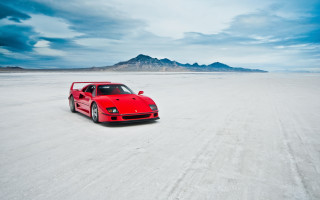 Red sports car desert mountains 3 - a desert area free wallpaper