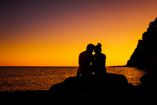 Couple rock ocean sunset romantic - a couple of people free wallpaper