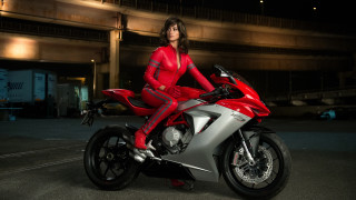 Woman red motorcycle night parking - a red outfit free wallpaper for desktop