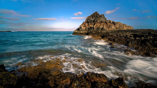Rocky shore clouds blue sky - a rocky shore free wallpaper for desktop