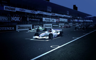 Racecars night stadium city lights - a crowd watching free wallpaper