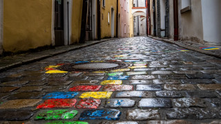 Narrow street rainbow drain yellow - neofauvism free wallpaper