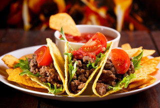 Tacos meat tomatoes chips fire - a fire in the background free wallpaper