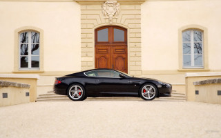 Black sports car neoclassicism building - the side of it free wallpaper