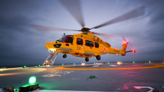 Yellow helicopter takeoff night green - an airport runway free wallpaper