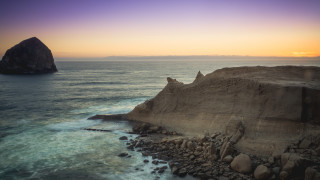 Rocky cliff water outcropping beach - a rocky cliff free wallpaper