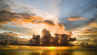 Sunset clouds ocean reflection beach - colorful cloud free wallpaper