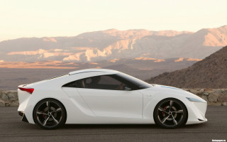 White sports car mountain range 2 - a white sports car free wallpaper for desktop