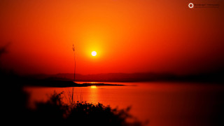 Sunset waterboat lighthouse autumn matte - a light house in the distance free wallpaper