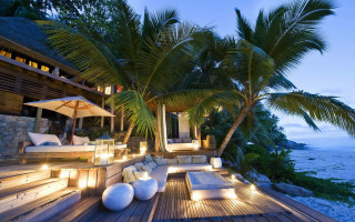 Lounge palm ocean night lights - a deck free wallpaper for desktop