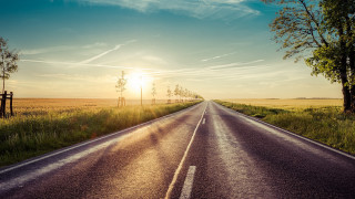 Sunrise road trees clouds lake - a line of trees free wallpaper for desktop