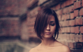 Woman brickwall closedeyes bun hair - short hair free wallpaper for desktop