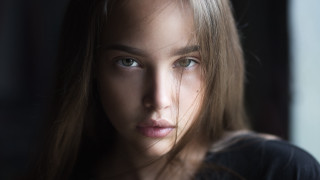 Elina karimova serious portrait brown - her face and shoulder free wallpaper