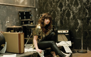 Woman sitting suitcase recordplayer room - dorothy coke free wallpaper