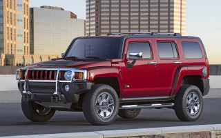 Red hummer truck city skyline - skyscraper free wallpaper