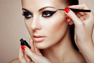 Woman red nails black eyeliner - a black eyeliner free wallpaper