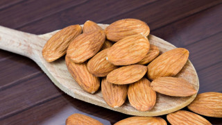 Wooden spoon almonds wooden table - a wooden spoon free wallpaper for desktop